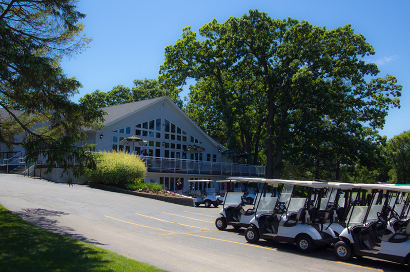 Golf carts near clubhouse